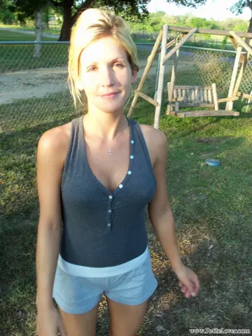 Blonde MILF Poses Outdoors in Jeans, Shorts and Panties