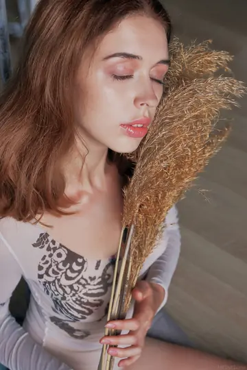 Tall Slim Redhead Undresses and Spreads Her Pussy Wide