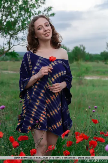 Busty Woman Strips Out of Her Panties in the Rural Yard