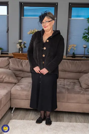 Mature European Woman in Glasses Strips to Lingerie
