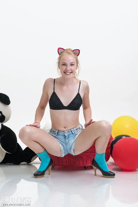 Pale Blonde Strips Out of Her Shorts and Spreads Her Pussy in Socks and Heels – photo 4 of 20