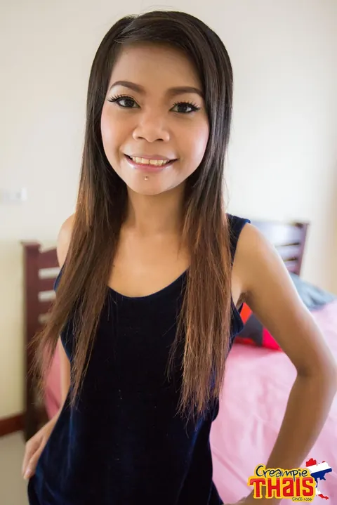 Petite Asian Babe Strips and Spreads on the Bed – photo 1 of 20