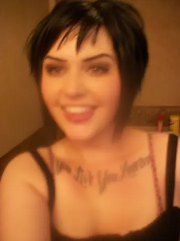Short-Haired BBW Flaunts Her Big Tits and Fingers Her Shaved Pussy in Selfie