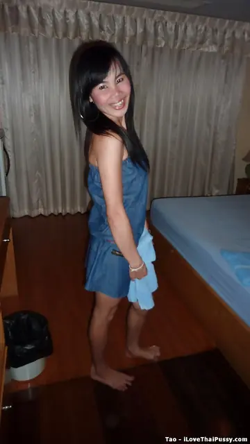 Asian Woman Pulls Her Panties Aside and Spreads Her Shaved Pussy Wide