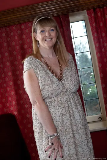 Pale Blonde MILF Shows Her Big Tits and Hairy Pussy