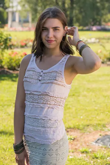 Zhenya Mille – European Brunette Strips Out of Her Skirt and Shows Her Shaved Pussy Outdoors