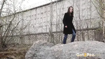 Lara Fox – Skinny Czech Brunette Squats on Boulders to Piss Outdoors