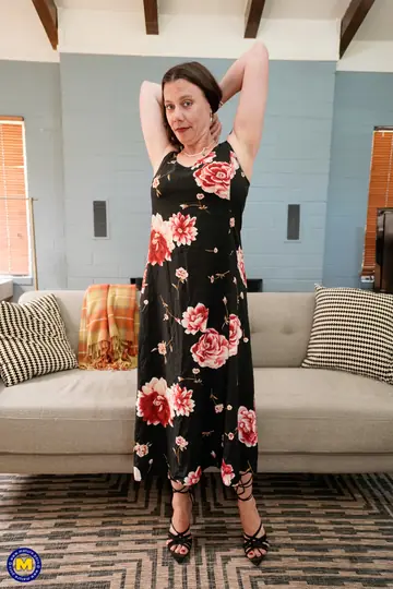 Mature European Woman Strips Nude and Poses to Show Her Big Ass