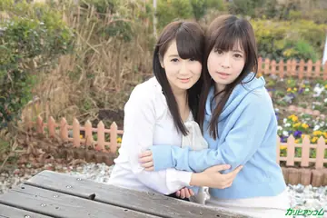 Asian Lesbians Kiss and Finger Each Other on the Bed