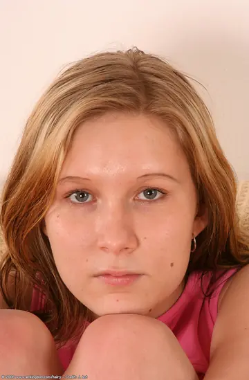 European Blonde Pulls Panties Aside to Finger Her Hairy Pussy