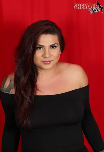 Curvy Trans Woman with Big Tits Poses in Her Dress