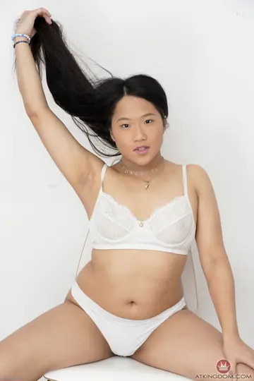 Petite Thai Brunette Undresses and Spreads Her Pussy