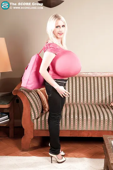 Beshine – Mature Blonde Shows Off Her Big Tits in Jeans