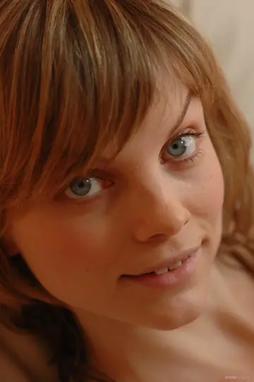 Woman with Small Tits Poses Nude and Spreads Her Pussy