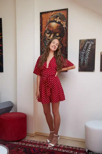 Woman Slips Out of Her Skirt and Poses Nude