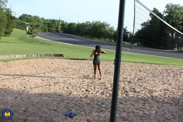 Ebony Brunette Reveals Her Pussy in a Tight Dress on the Sand