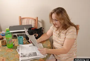 Venus – Thick Mature Brunette in Glasses Strips and Fingers Her Shaved Pussy