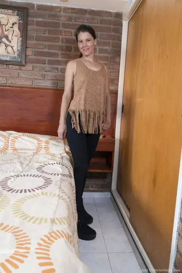 Slim Hairy Amateur Undresses and Spreads Her Legs