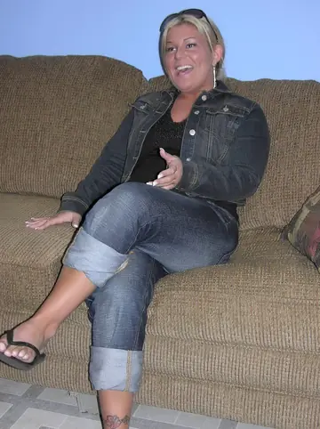 Chubby MILF Strips Out of Her Jeans on the Sofa