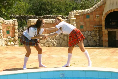 Carla Brown: Brunettes in Bikinis and Skirts Kiss Poolside – photo 3 of 21