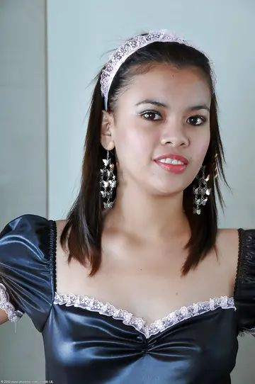 Petite Asian Woman in a French Maid Uniform Spreads Her Legs