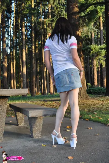 Curvy Trans Woman Shows Her Long Legs in a Miniskirt and Heels Outdoors