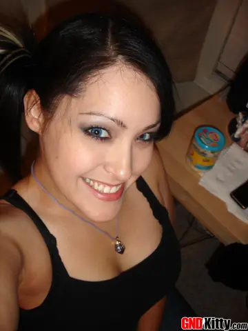 Thick Asian Brunette in Pigtails Shows Her Ass in Shorts Selfie