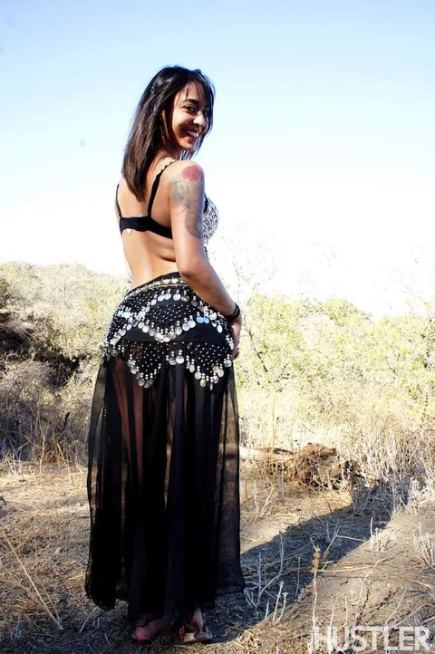 Penelope Stone: Busty Tattooed Brunette Strips Naked in the Forest – photo 2 of 16