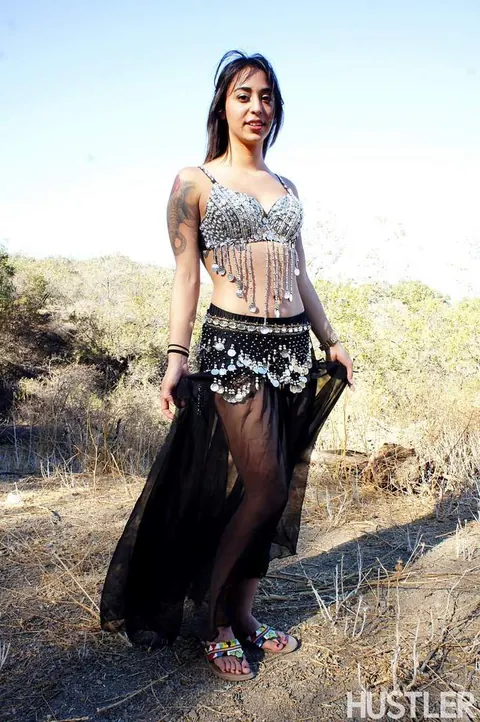 Penelope Stone: Busty Tattooed Brunette Strips Naked in the Forest – photo 1 of 16