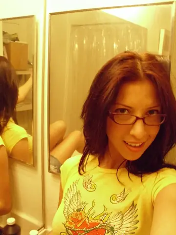 European Brunette in Glasses Takes Nude Mirror Selfies