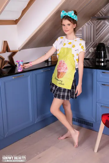 Woman Flashes Panties and Strips Naked in the Kitchen