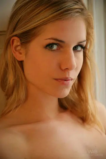 Blonde Beauty Strips Nude and Spreads Her Pussy Wide