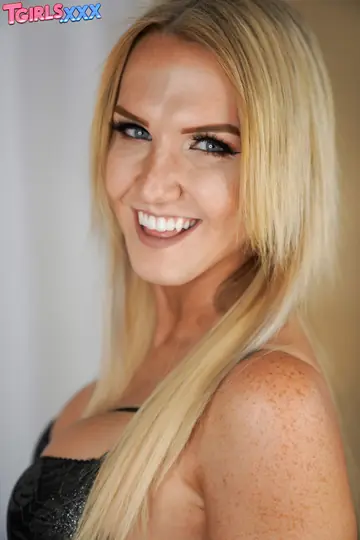 Busty Trans Woman Removes Her Lingerie and Poses Fully Nude