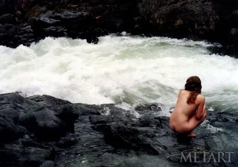 Woman Undresses and Poses Nude Arching Her Back – photo 14 of 21