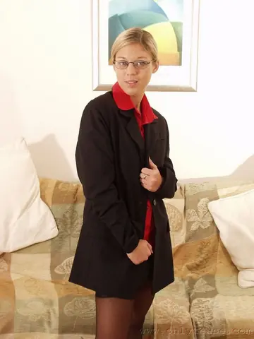 Woman in Lingerie and Stockings Undresses and Spreads