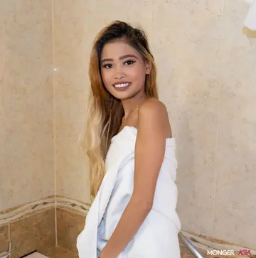 Asian Woman Kisses Partner and Spreads Her Legs in the Bathroom