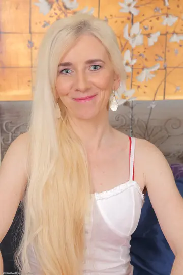 Pale Mature Blonde in Lingerie Gives a Blowjob and Gets Fucked
