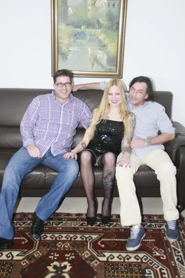 Tattooed European in Glasses Sucks Cock in a Bondage Threesome on the Sofa