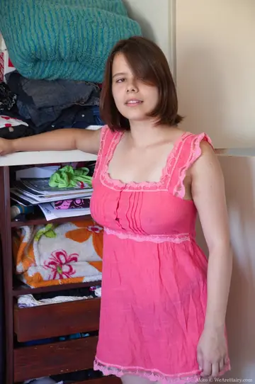 Latina with Short Hair Lifts Her Skirt to Spread Her Hairy Pussy