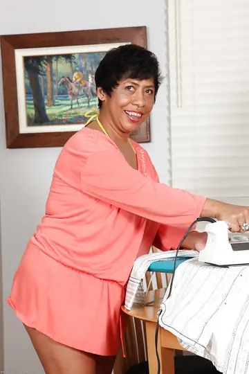Mature Latina Strips Out of Her Bikini and Panties