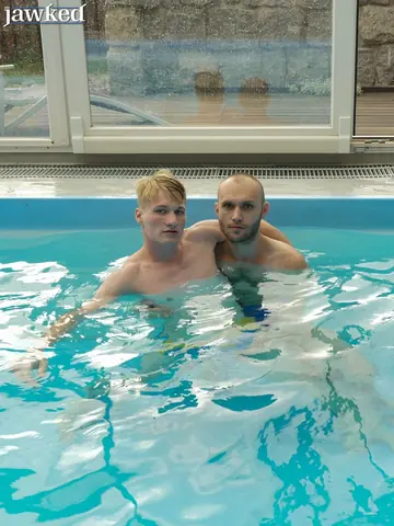 Two Men Strip Nude and Turn to Display Bodies