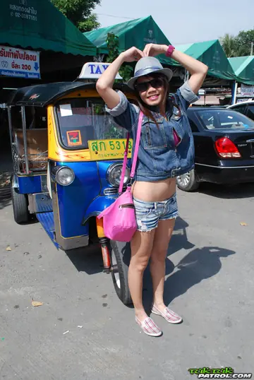 Thai Woman in Glasses Poses Nude by a Bike Taxi Outdoors