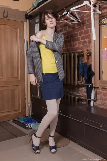 Slim European Redhead Lifts Her Skirt and Fingers Her Hairy Pussy