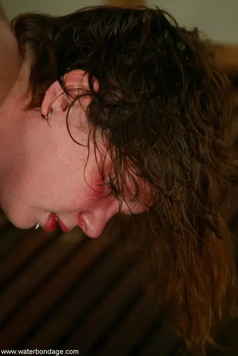 Redhead with Short Hair Endures Water Bondage While Restrained – photo 14 of 20