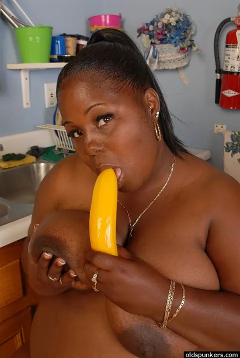 Busty Ebony MILF Uses a Yellow Dildo – photo 11 of 16