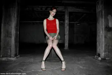 Tall Arab Redhead in a Skirt and Heels Uses a Dildo While Bound