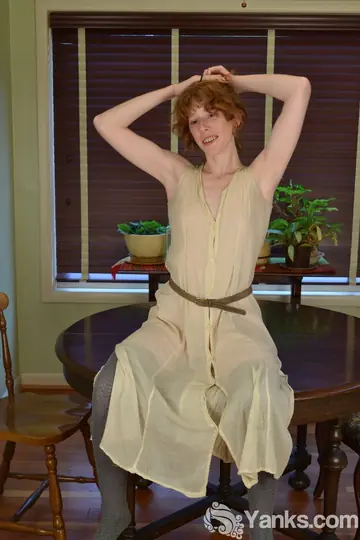 Slim Redhead Amateur Rubs Her Clit and Uses a Dildo on the Table