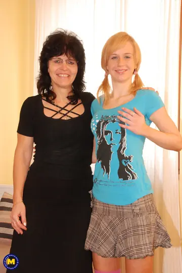 Mature European Blondes Kiss and Share a Double Dildo