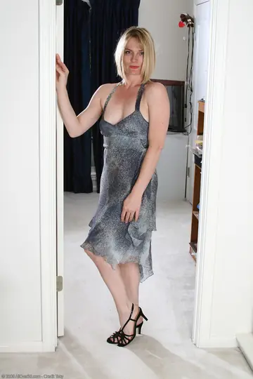 Blonde MILF Lifts Her Skirt and Spreads