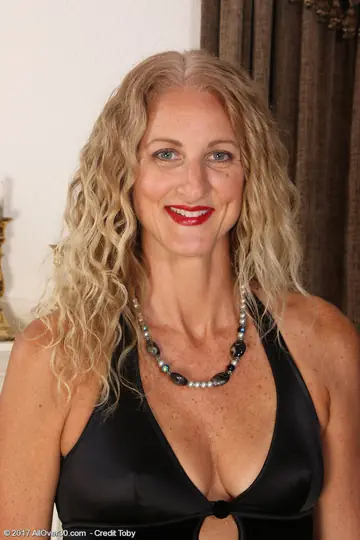Tanned Blonde MILF Spreads Her Legs and Shows Her Pussy